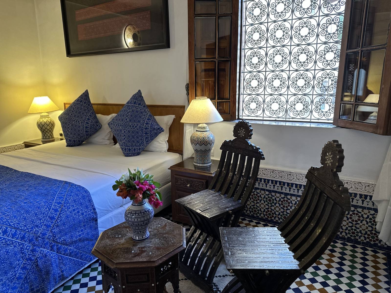 Blue room with traditional Moroccan seating at Riad Mazar Fes