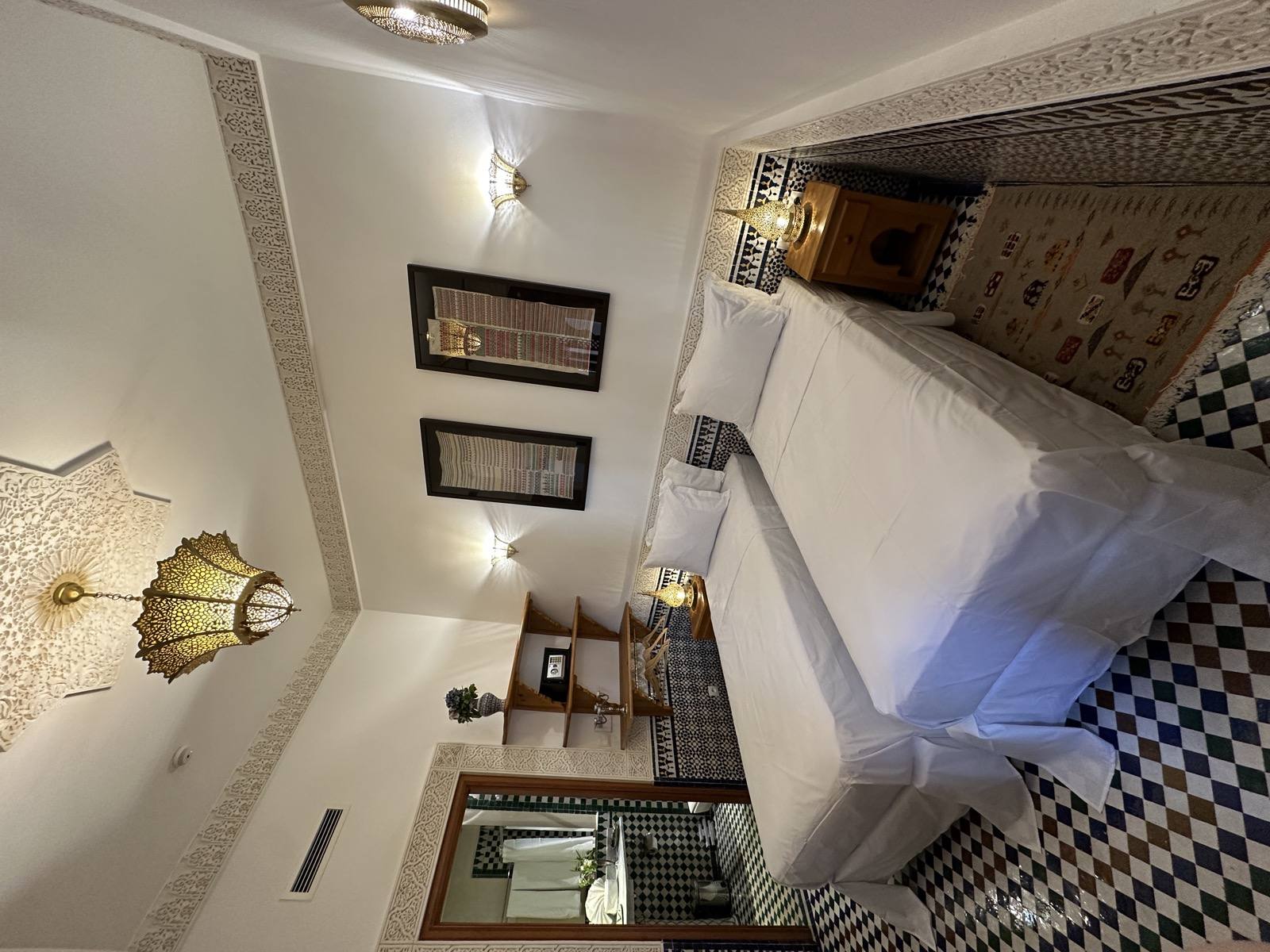 Standard double or twin room with carved window detail at Riad Mazar Fes